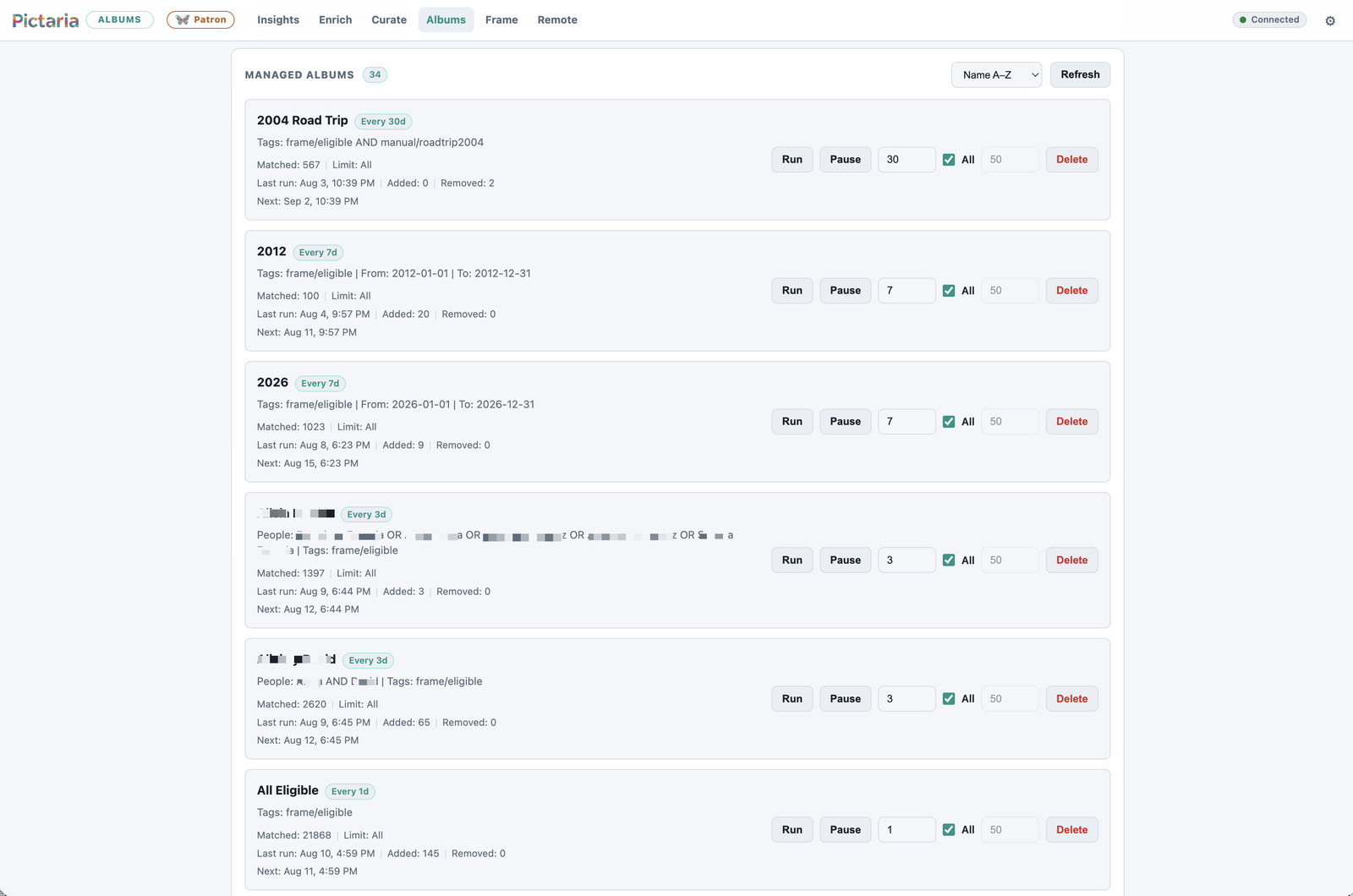 Pictaria Server managed Smart Albums list with rule-based albums, their schedules, match counts, and last-run results